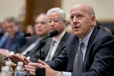 As Goldman Sachs drags on financials, Cramer and other experts weigh in