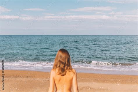 Naked Woman Loking At The Sea Stock Photo Adobe Stock