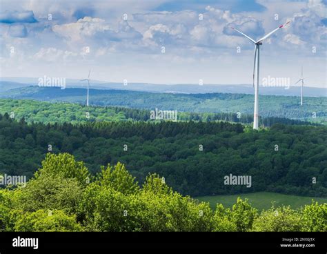 landscape wind turbines forest spring sustainability renewable energy saarland nature germany ...