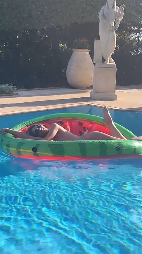 Liz Hurley Stuns Fans As She Poses Completely Nude On An Inflatable