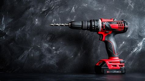 red  black cordless drill   metal drill bit   black