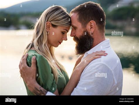 Happy Mature Couple In Love Hugging In Nature Stock Photo Alamy