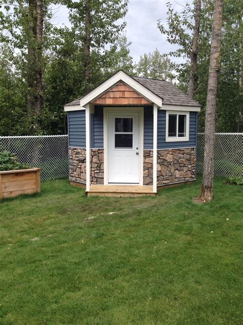 Corner shed with stone | Backyard sheds, Corner sheds, Garden shed ...