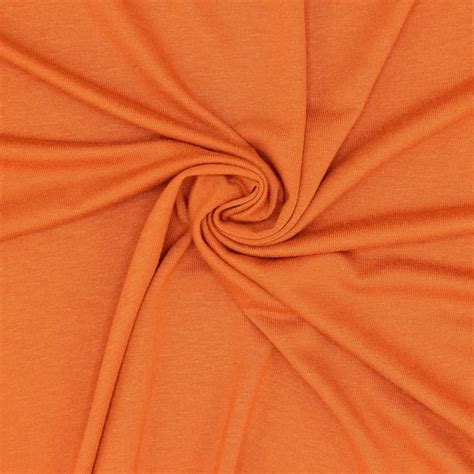 Tissu jersey viscose orange brûlée