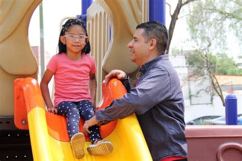 Divorced Dad With His 5 Year Old Brunette Latina Daughter Play In The Park Games And Spend