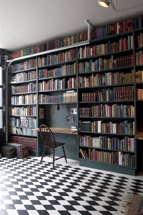 The Bookcase Was Custom Built And Filled With Rare Books Sourced By A