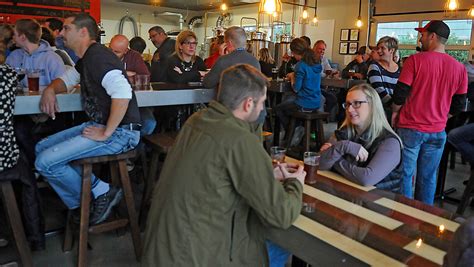 Beer fans crowd Bad Habit Brewing Company at opening