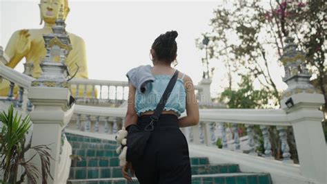 A Brunette Woman Climbs The Stairs At A Temple In Thailand Stock Footage Video Of Front