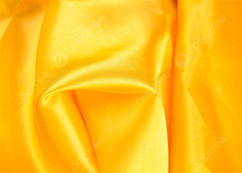 background foto kain kain sutra kuning kain tekstil kuning latar