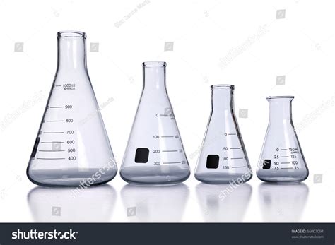 Laboratory Flasks Of Different Sizes With Reflection On Table Stock