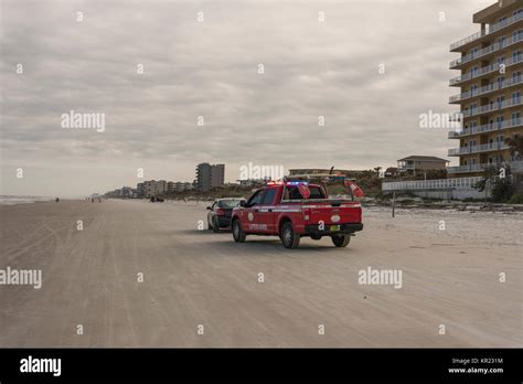 Traffic stop on the Florida Beach vehicle Access lane Stock Photo - Alamy