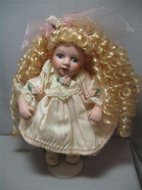 Porcelain Doll Blonde Hair Blue Eyes Long Lashes Pink Dress White Laced Blonde Hair Ringlet Name