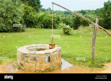 Water Well With Bucket And Lever Stock Photo Alamy