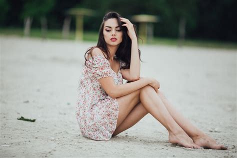 Premium Photo Brunette Woman Wearing A Floral Dress