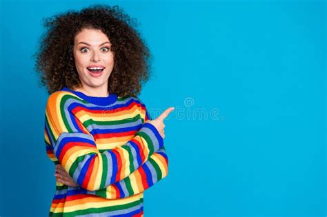 Photo Portrait Of Attractive Young Woman Point Excited Empty Space Dressed Stylish Rainbow Print