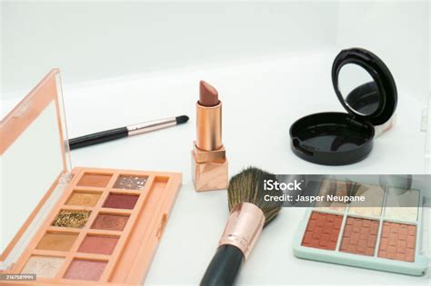 makeup  beauty products including lip gloss foundation makeup kit
