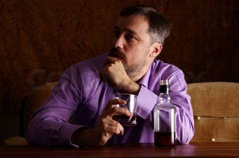 guy drinking whiskey stock image colourbox