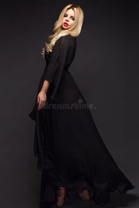 Beautiful Blonde Girl With Sensual Lips Fashion Hair Black Dress Beauty Face Stock Image