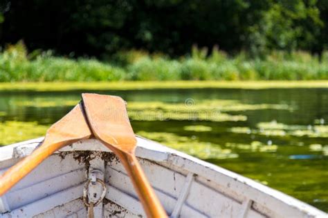 Wooden Rowing Boat on a Lake in UK Stock Image - Image of peaceful, background: 102335693