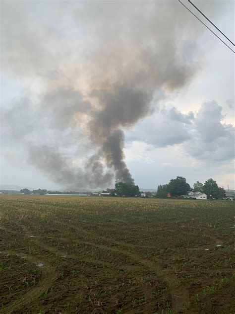 Local fire crews work to put out large Amherst barn fire | WWLP