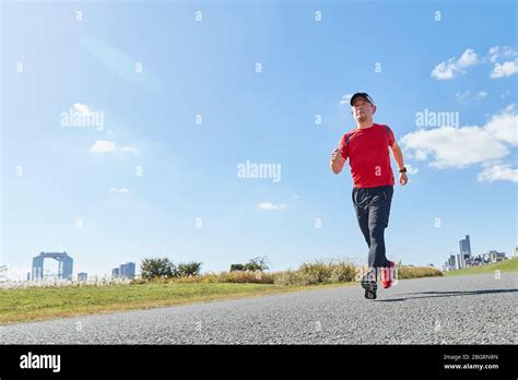 Mature Japanese Man Training Downtown Stock Photo Alamy