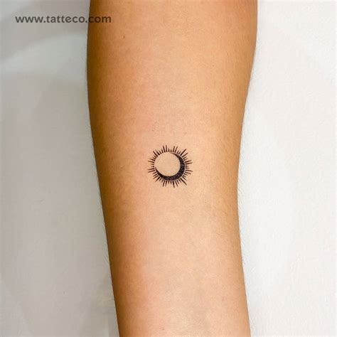 Eclipse Temporary Tattoo Located On The Inner Forearm