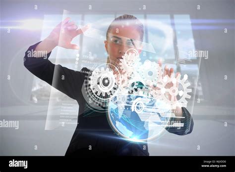 Digital Composite Of Blonde Businesswoman Touching Interface With Earth