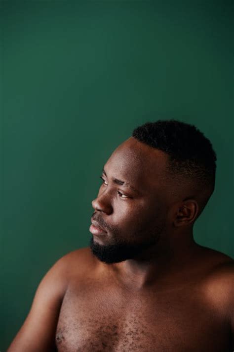 A Shirtless Man Looking Afar · Free Stock Photo