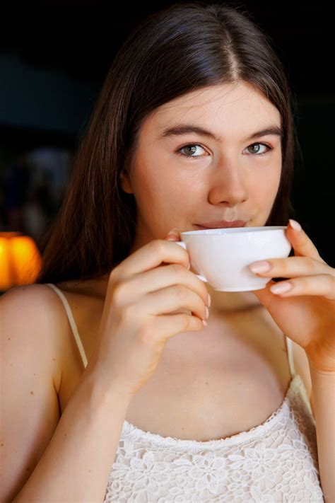 Brunette Marichka Glory Doing Striptease And Exposing Her Shaved Pussy 12 Photos