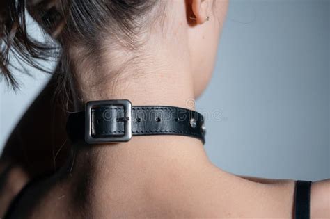 Naked Woman In Black Leather Bdsm Collar With Metallic Ring Nude Female In Seductive Role