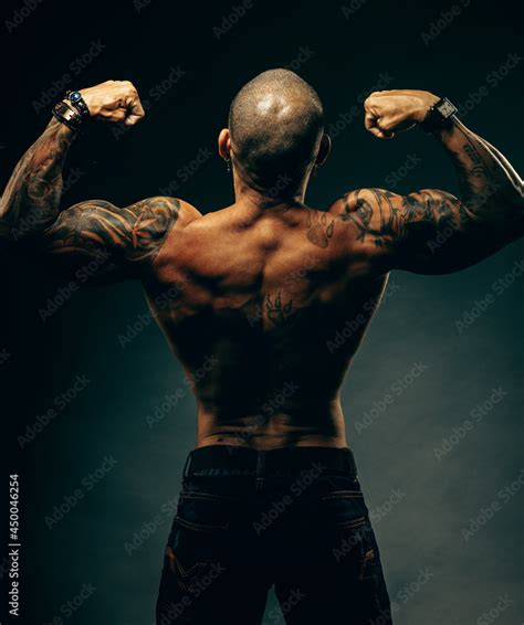 Studio Portrait Of A Muscular African American Or Latino With A Naked Torso Male Strength And