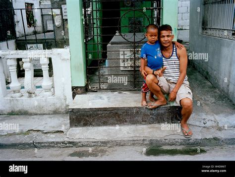 People Who Live Amongst The Graves In Manila North Cemetery In Manila