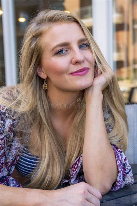 A Lovely Blonde Model Enjoys A Summers Day Outdoors At The Park Stock Photo Image Of Happy