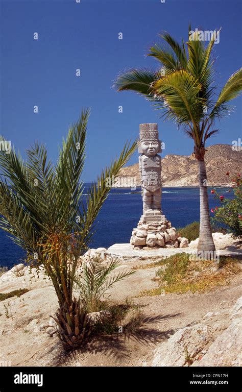 A Lone Stone Aztec Statue Stands At The Edge Of The Sea Of Cortez In