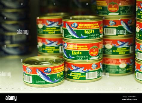 Sardine Fish Cans On Shelf Of Thailand Grocery Supermarket Stock Photo