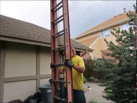 setting  extension ladder youtube