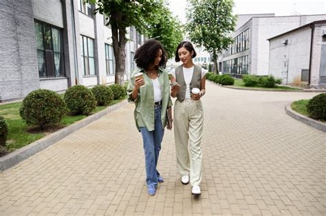 A Lesbian Couple Walks Together Enjoying Stock Image Image Of Outdoors Outfit