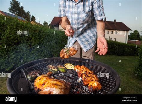 barbecue in the garden Stock Photo - Alamy