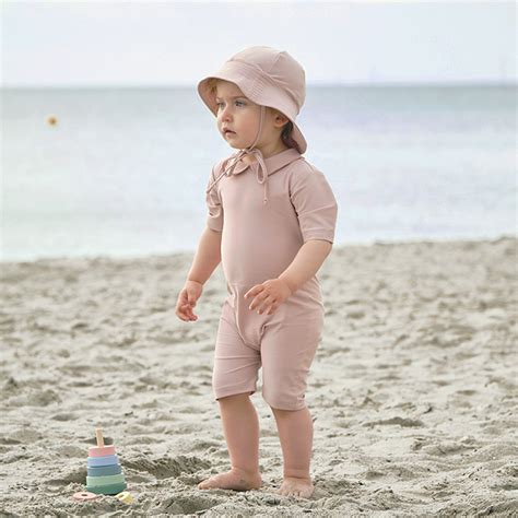 Palma Uv Sunsuit S S Rose Nude Petit Crabe