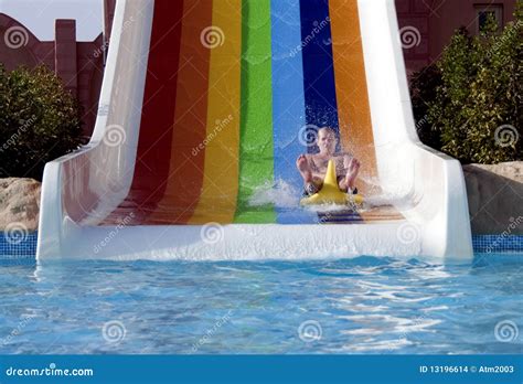 Fun on water slide stock photo. Image of construction - 13196614