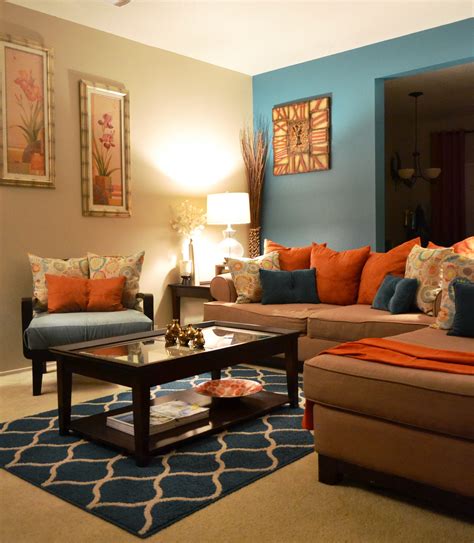 Trendy Decorating Living Room In Orange Wall with fire place and wall ...