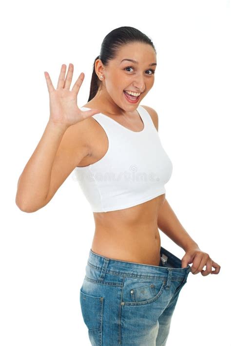 Mujer Joven Delgada Feliz En El Bikini Blanco Que Salta En El Mar Foto De Archivo Imagen De