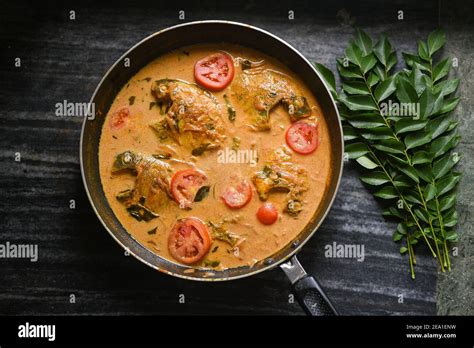 Top View Spicy Kerala Style Fish Curry Stew And Appam Fish Molee Meen