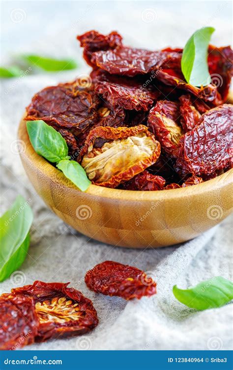 Organic Sun Dried Tomatoes In A Wooden Bowl Stock Photo Image Of