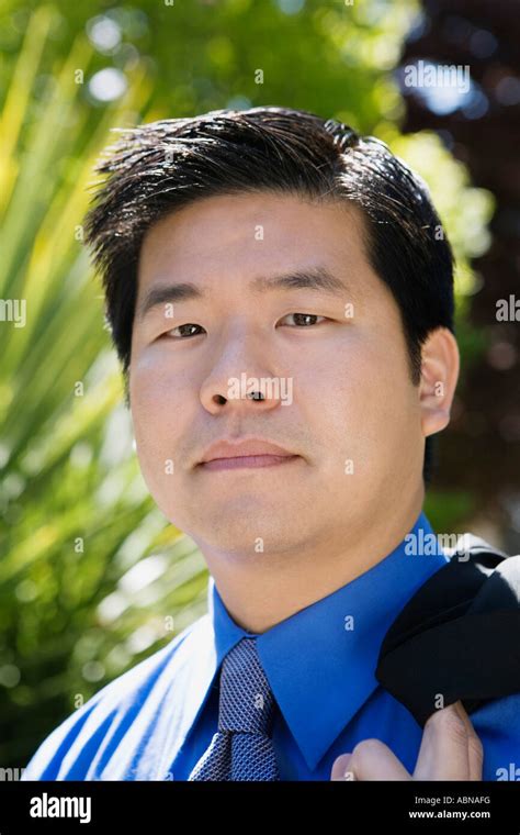 Businessman Carrying Jacket Over Shoulder Stock Photo Alamy