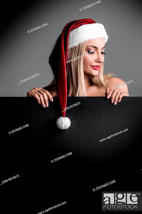 Sexy Naked Santa Woman Posing With Black Blank Banner With Copy Space Stock Photo Picture And