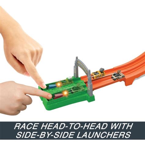 HOT WHEELS PISTA CITY RACERVERSE JURASSIC WORLD Auge App Representações