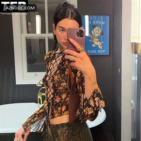 Dua Lipa Sexy Poses Showing Off Her Nude Tits In A See Through Top On Social Media AZNude