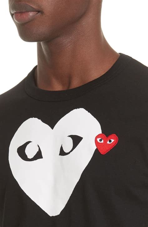 A Single Color Heart Logo Print Brands A Soft Durable Cotton Crewneck