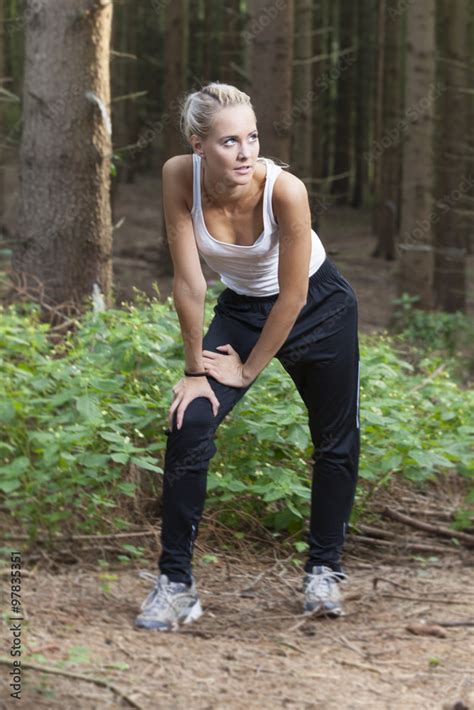 Blonde Frau Beim Dehnen Im Wald Stock Photo Adobe Stock